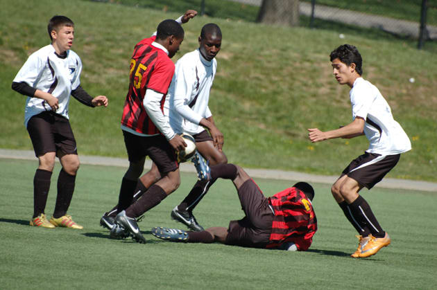 Bakary (center) and South Bronx United play against the Rosedale Rockets in the Icahn Stadium on Randall’s Island in 2012.